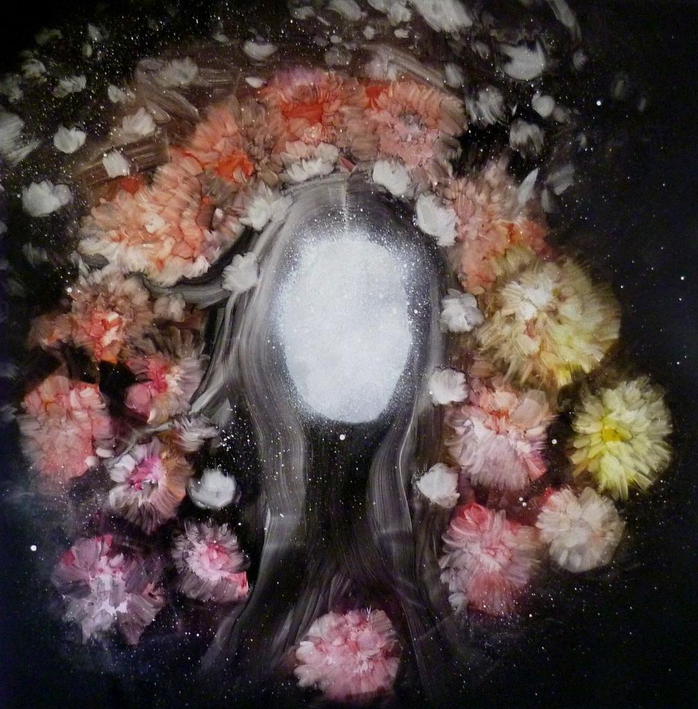 A faceless white figure framed by a dense wreath of flowers on a black ground.